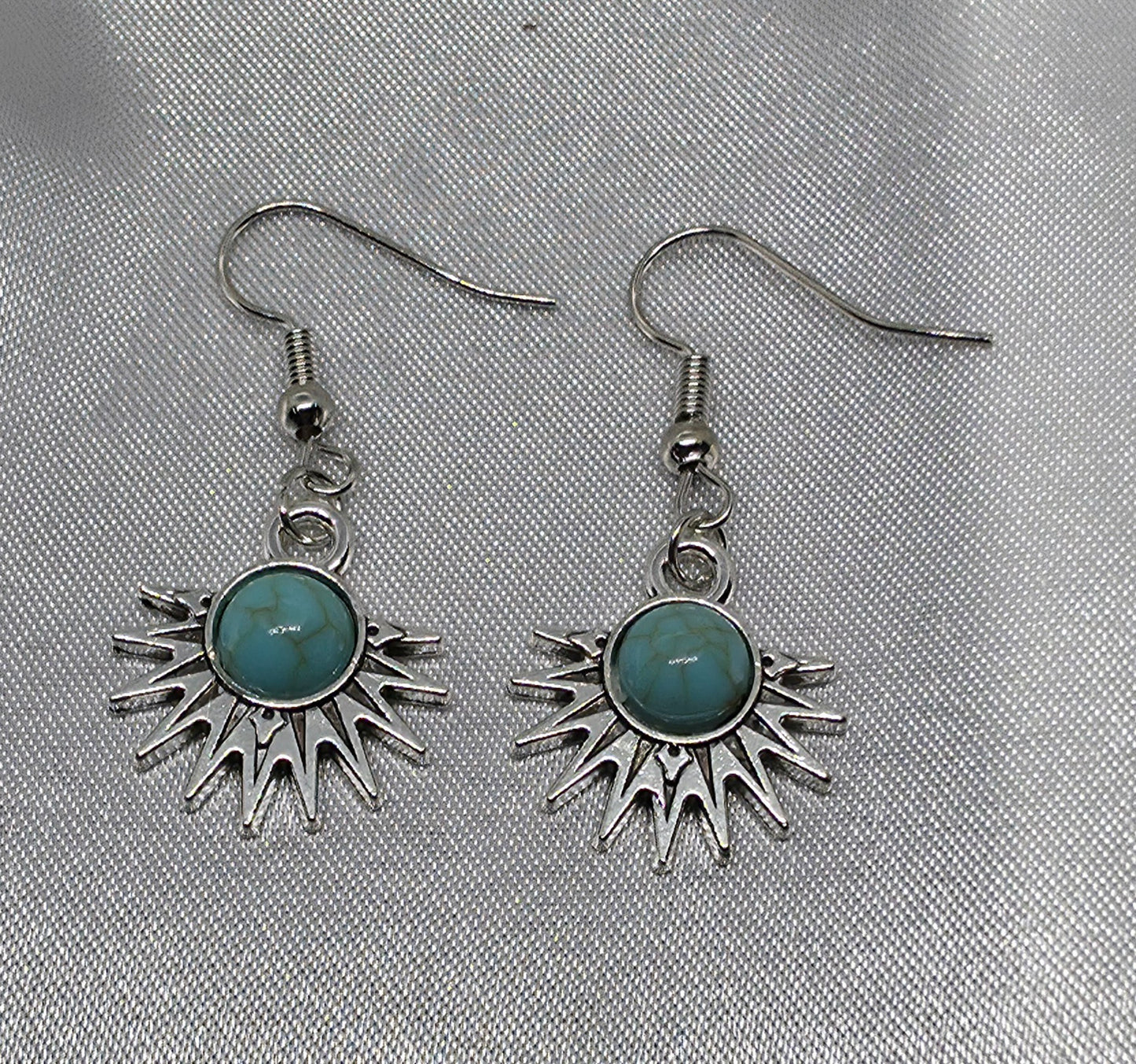 Star burst torquise earrings
